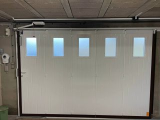 Motorisation de porte de garage coulissante sectionnelle Eurohabitat Sens